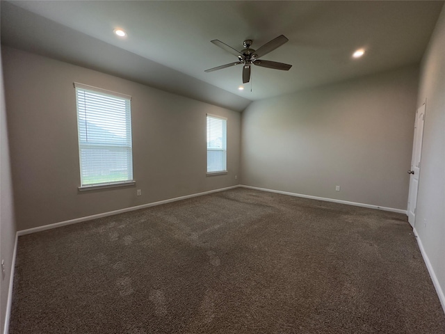 empty room featuring recessed lighting, dark carpet, baseboards, and ceiling fan