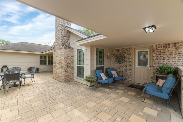 view of patio featuring outdoor dining space