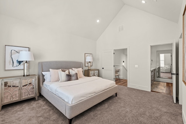 carpeted bedroom with visible vents, recessed lighting, high vaulted ceiling, and baseboards