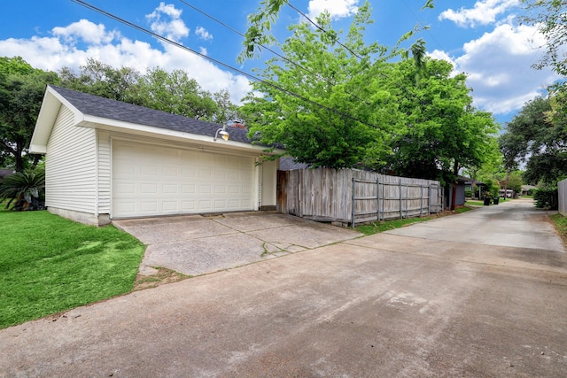 garage with fence