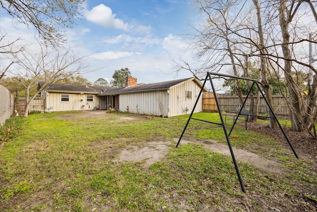 view of yard with a fenced backyard