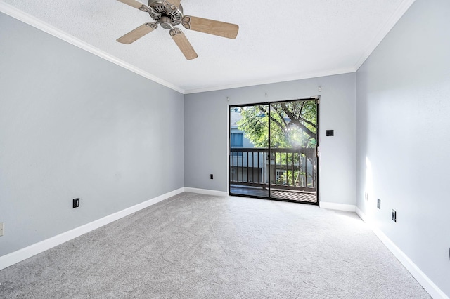 unfurnished room with ornamental molding, a textured ceiling, carpet flooring, baseboards, and ceiling fan