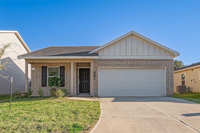 ranch-style house with board and batten siding, concrete driveway, a garage, brick siding, and central AC unit