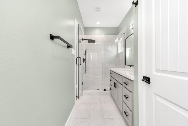 full bathroom with vanity, visible vents, baseboards, a marble finish shower, and marble finish floor