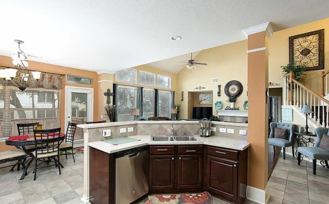 kitchen with dark brown cabinets, dishwasher, light countertops, a peninsula, and a sink