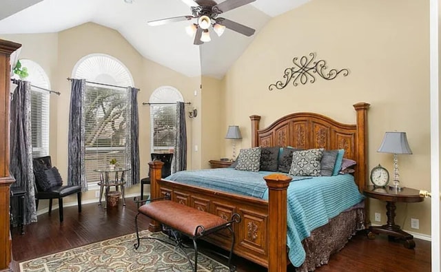 bedroom featuring vaulted ceiling, wood finished floors, and baseboards