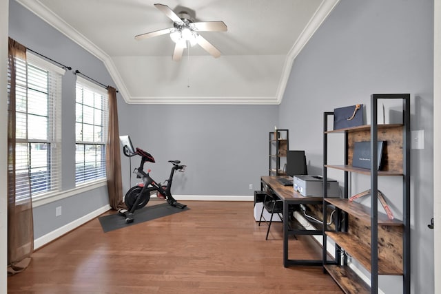 office area with a ceiling fan, crown molding, wood finished floors, and lofted ceiling