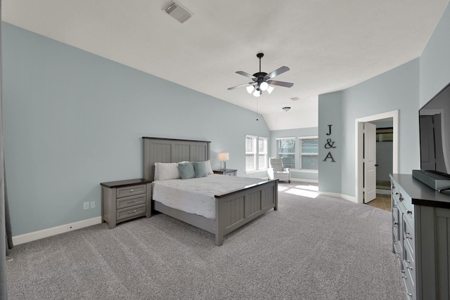 bedroom featuring a ceiling fan, visible vents, baseboards, lofted ceiling, and light colored carpet