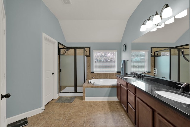 bathroom featuring a sink, a bath, and a shower stall