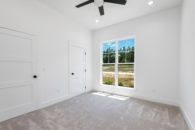 unfurnished bedroom with recessed lighting, baseboards, a ceiling fan, and carpet flooring