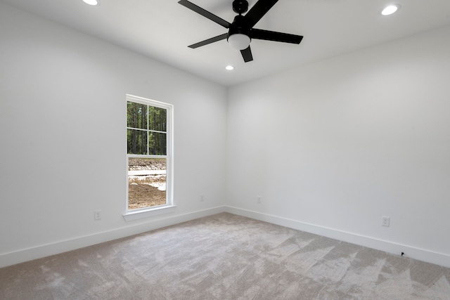 carpeted empty room with recessed lighting, baseboards, and ceiling fan