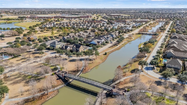 aerial view with a water view and a residential view