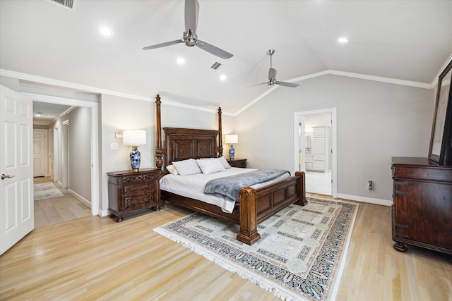 bedroom with visible vents, lofted ceiling, light wood-style flooring, ensuite bathroom, and crown molding