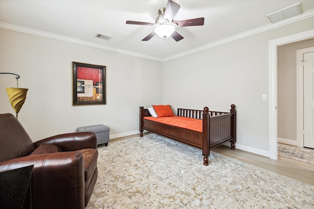 bedroom featuring visible vents, baseboards, and ornamental molding