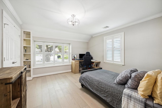 bedroom with light wood-type flooring, visible vents, crown molding, baseboards, and vaulted ceiling