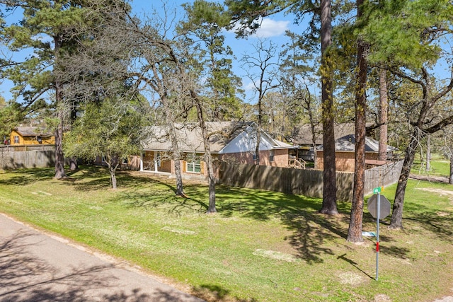 19331 E Lakeshore Dr, Magnolia, TX 77355 - view of front of home featuring brick siding