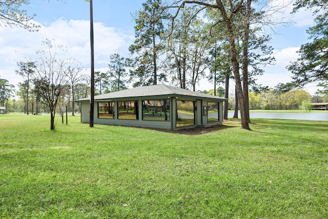 19331 E Lakeshore Dr, Magnolia, TX 77355 - surrounding community with a yard and a water view