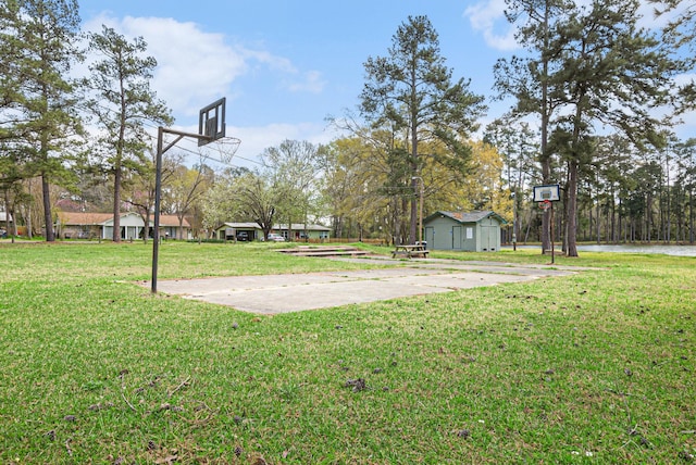 19331 E Lakeshore Dr, Magnolia, TX 77355 - view of sport court featuring a lawn and community basketball court