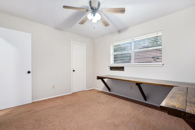 19331 E Lakeshore Dr, Magnolia, TX 77355 - carpeted spare room with ceiling fan and baseboards