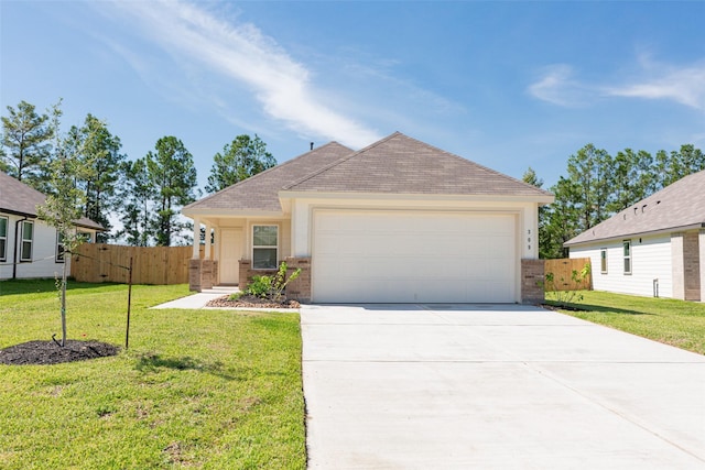 view of front of home with brick siding, driveway, and fence