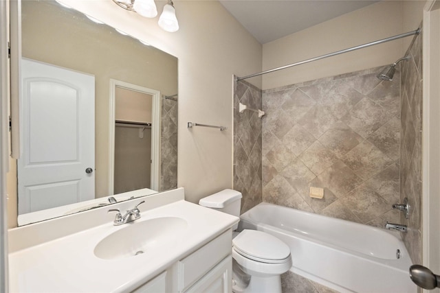 full bath with vanity,  shower combination, and toilet