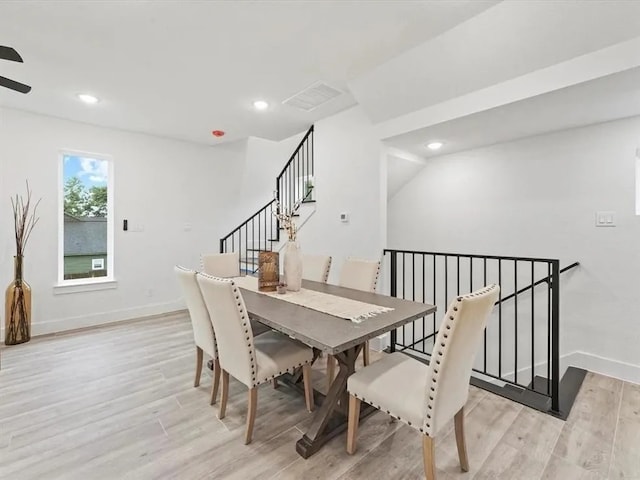 dining room with visible vents, recessed lighting, light wood-type flooring, and baseboards