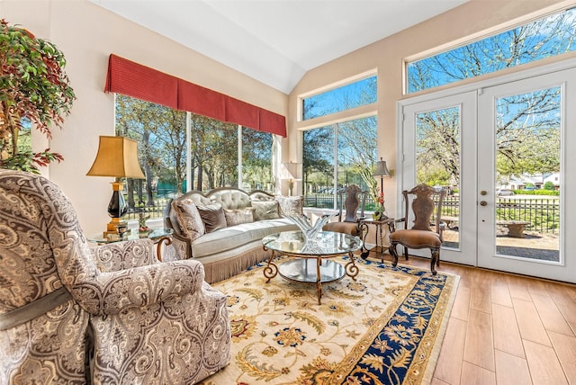 sunroom / solarium with vaulted ceiling