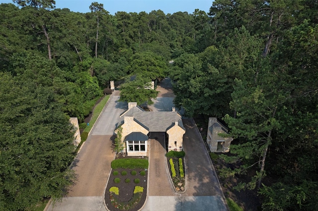 aerial view featuring a view of trees