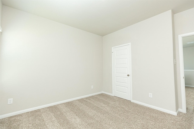 13774 Sunshine Peak Dr, Willis, TX 77318 - unfurnished room with light carpet and baseboards