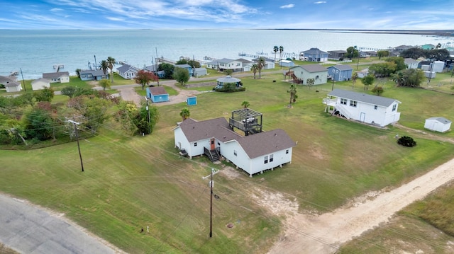 bird's eye view featuring a residential view and a water view