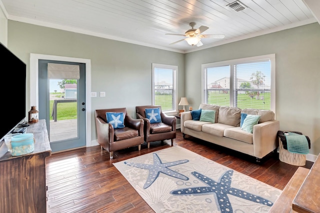 11 Enchanted Ln, Port Alto, TX 77979 - living room featuring ornamental molding, plenty of natural light, dark wood-type flooring, and ceiling fan