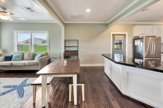 11 Enchanted Ln, Port Alto, TX 77979 - kitchen featuring freestanding refrigerator, plenty of natural light, crown molding, white cabinetry, and ceiling fan