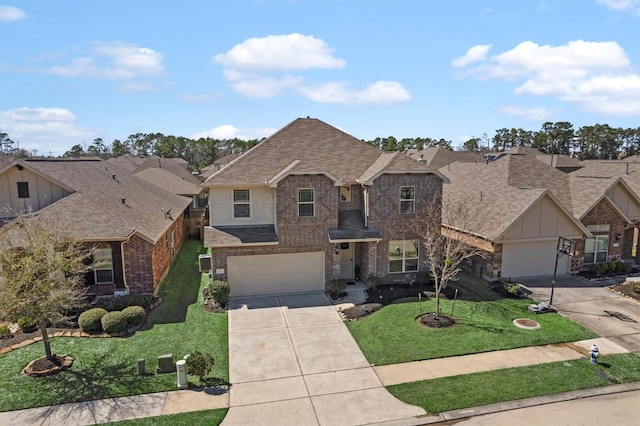 traditional home with driveway, a residential view, a front yard, a shingled roof, and brick siding