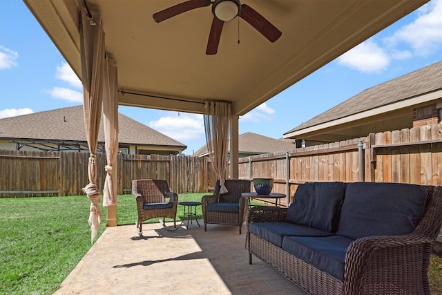 view of patio featuring an outdoor living space, a fenced backyard, and ceiling fan