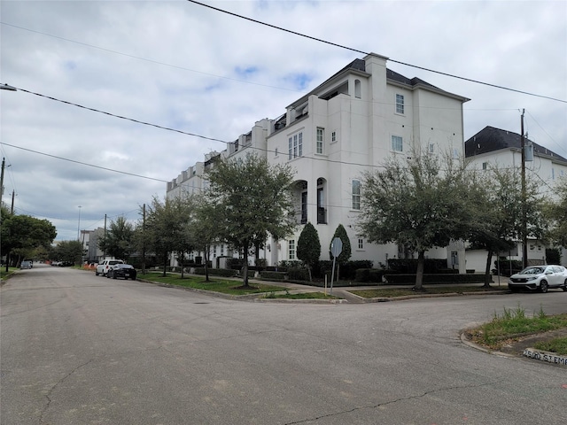 view of road featuring sidewalks and curbs