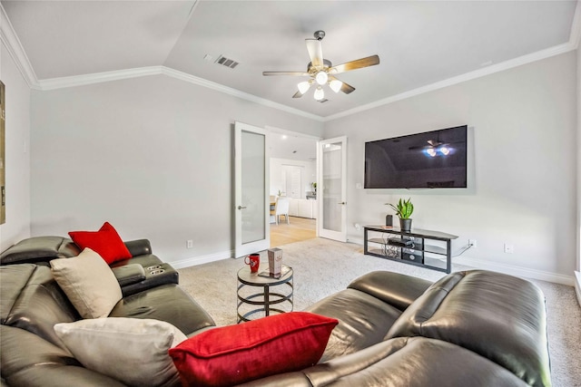 living area with visible vents, ornamental molding, carpet floors, baseboards, and vaulted ceiling