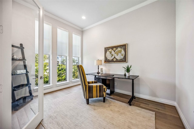 office space featuring recessed lighting, baseboards, wood finished floors, and crown molding