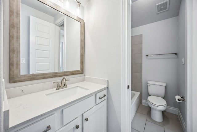 bathroom with visible vents, toilet, tile patterned flooring, baseboards, and vanity