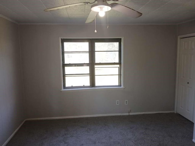 unfurnished room with ceiling fan, baseboards, and carpet floors