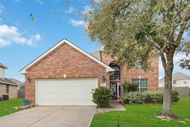 traditional-style home featuring a front yard, a garage, brick siding, and concrete driveway