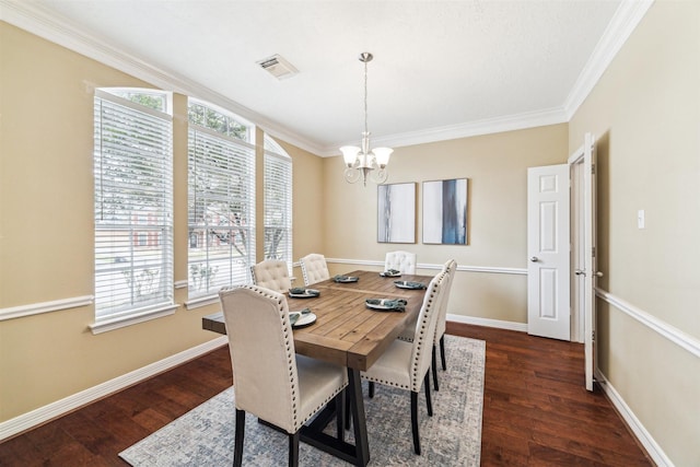 dining space with visible vents, dark wood-style flooring, a chandelier, and baseboards