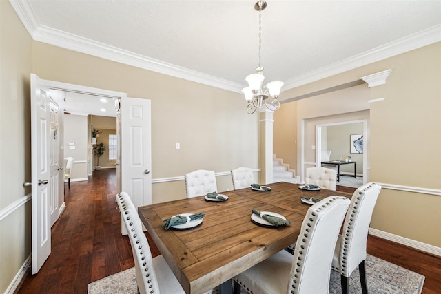 dining room featuring baseboards, an inviting chandelier, wood finished floors, and ornamental molding