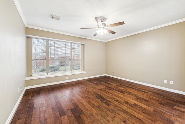 unfurnished room with dark wood finished floors, visible vents, and baseboards