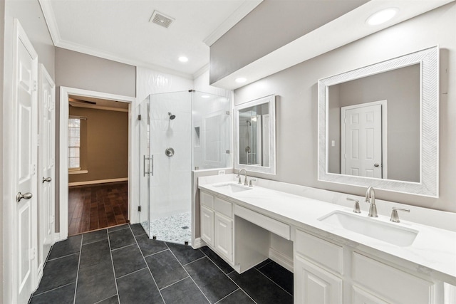 full bathroom with visible vents, a stall shower, and a sink