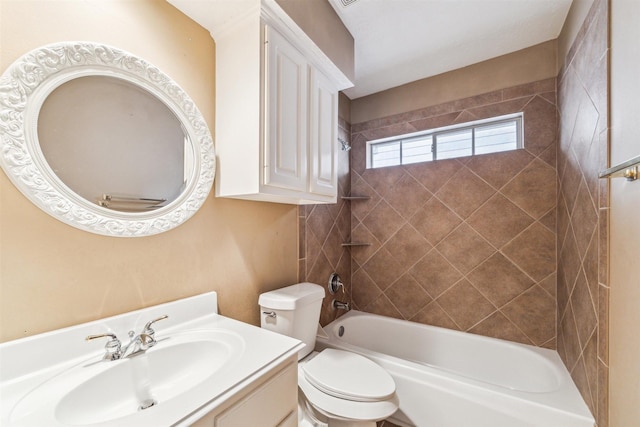 bathroom with shower / washtub combination, toilet, and vanity