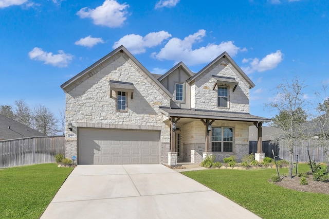 french country inspired facade with stone siding, a front lawn, and fence