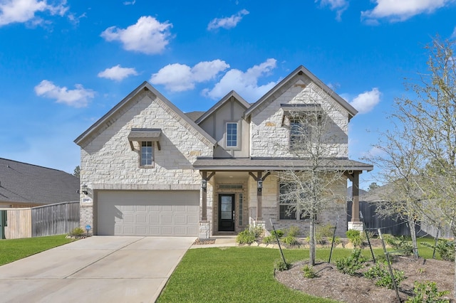 french provincial home featuring a front yard, fence, stone siding, and driveway