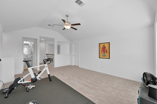 exercise room with visible vents, lofted ceiling, carpet floors, and ceiling fan