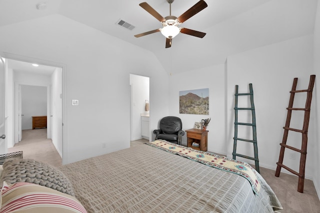 bedroom featuring visible vents, lofted ceiling, and light colored carpet