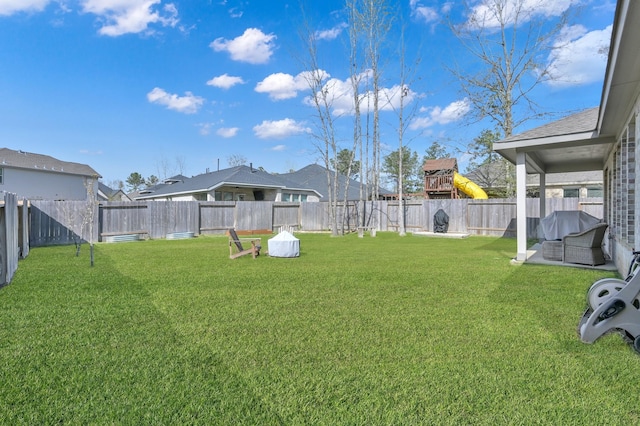 view of yard featuring a fenced backyard